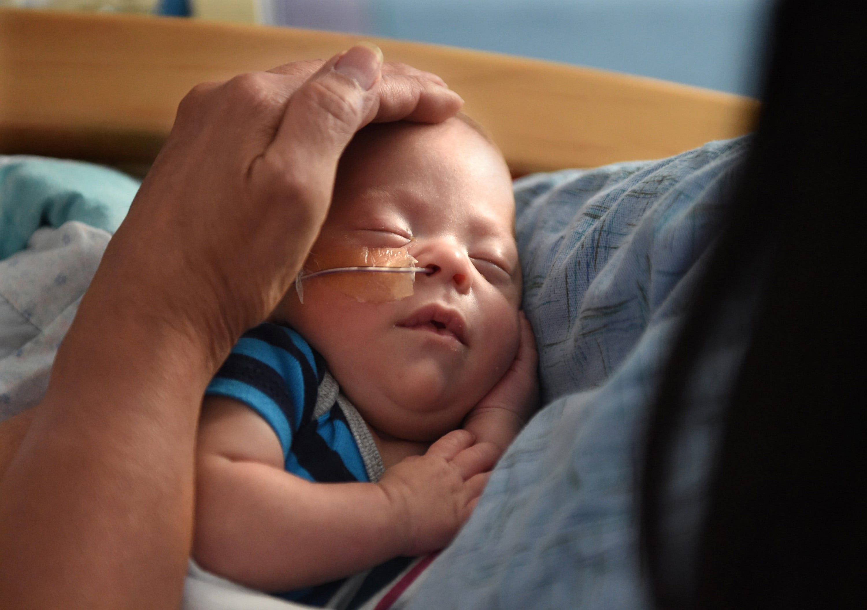 how to get a sick baby to sleep